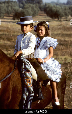 Young Andalusian couple from Dos Hermanas near Seville going to a local fiesta Stock Photo