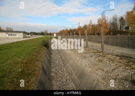 A maintained section of the barbed wire fencing around the former German concentration camp at Dachau, Munich, Germany. Stock Photo