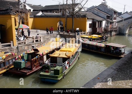 TOURIST BOATS or Sampans can be rented on the Canal AT the entrance to TIGER HILL GARDENS IN SUZHOU ,CHINA Stock Photo