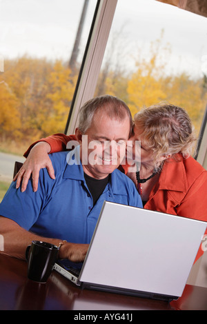 Man working on lap top computer Stock Photo