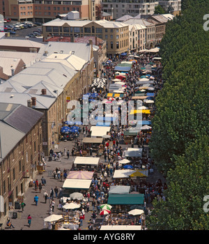 Looking down on Saturday morning market in full swing on Salamanca Place with double row of covered stalls Hobart Tasmania Stock Photo