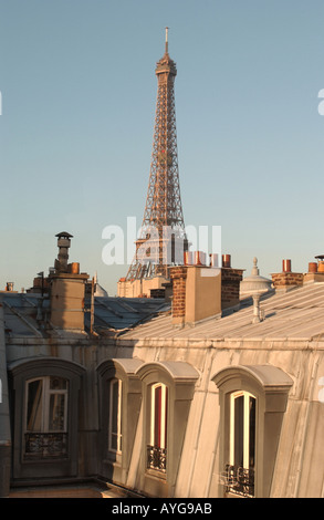 Eiffel Tower over the roof-tops of Paris. France. Stock Photo