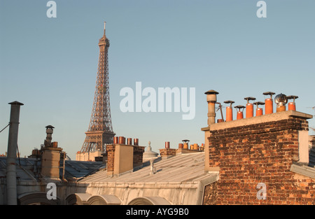 Eiffel Tower over the roof-tops of Paris. France. Stock Photo