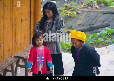 Zhuang Minority Mother Combing Young Daughter wearing traditional clothing Ping An Longsheng  China Stock Photo