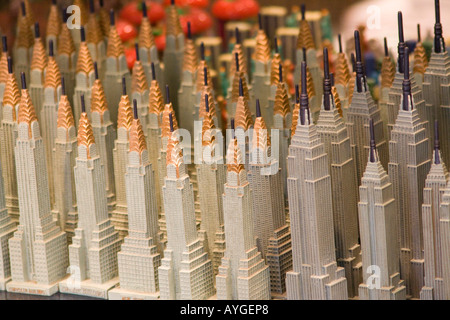 Small Souvenir Copies of the Empire State Building and the Chrysler Building in a Times Square Tourist Shop New York Stock Photo