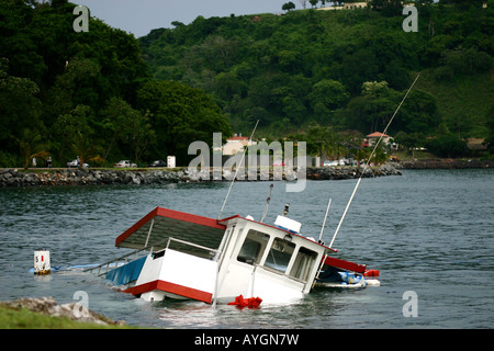 Sinking boat at a shore of Panama Amador area Stock Photo