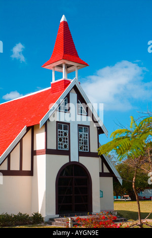 Notre Dame Auxiliatrice Church with distinctive red roof at Cap Malheureux in the North of Mauritius. Stock Photo