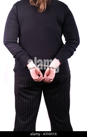 Frau von hinten in Handschellen / Back of Woman Wearing Handcuffs Stock Photo