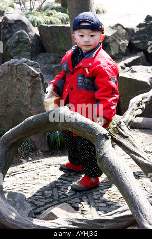 Young Chinese visitor to the famous,historic Tiger Hill Pagoda Gardens in Suzhou China Stock Photo