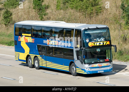 Siesta double deck holiday coach with graphics including use of web address Stock Photo