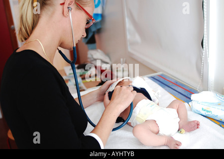 Amsterdam a newborn baby boy is being examined by a doctor in the VU university hospital Stock Photo