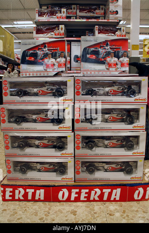 Unsold boxes of Mclaren toy cars left on the supermarket shelf in Spain. Reduced from 80 euros to 19 euros in an effort to sell Stock Photo