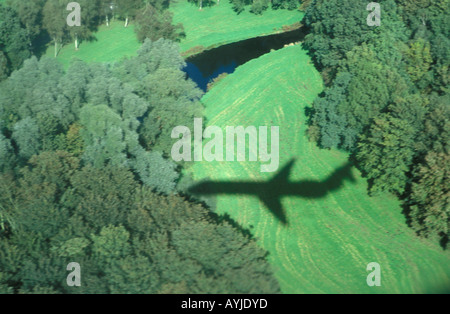The shadow of a plane landing on Schiphol Airport on the Amsterdamse Bos Stock Photo