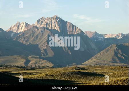Mount Whitney the highest point in the lower 48 states lit by early