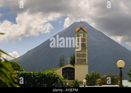 La Fortuna de San Carlos Catholic church tower with Arenal volcano Costa Rica Stock Photo