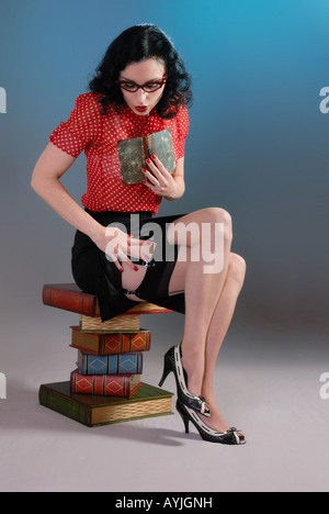 fifties retro vintage pinup librarian in stockings Stock Photo