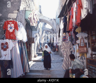 Old Arab woman walking on Via Dolorosa, Old City, Jerusalem, Israel Stock Photo