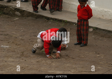 India Nagar Kullu District Himachal Pradesh Northern India A school in Nagar the pupils playing out side in the yard Stock Photo