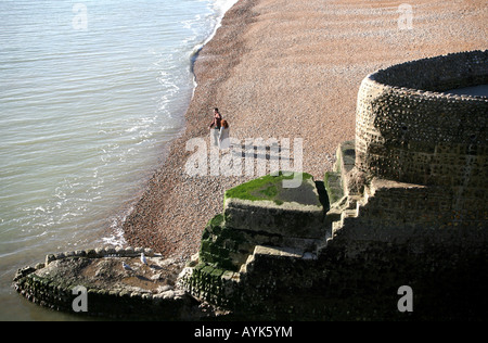 Couple on beach in Brighton England Stock Photo