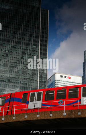 DLR train passes in front of the HSBC building in Canary Wharf, London