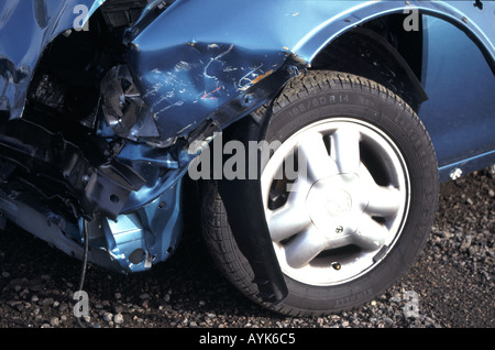 Crunched front end of car after road traffic accident Stock Photo