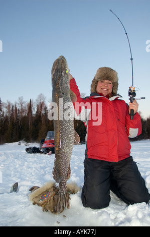 Pike Ice Fishing On River Stock Photo, Picture and Royalty Free