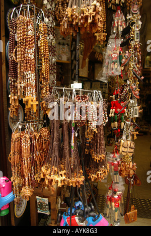 Souvenirs for sale, slingshots and trinkets in Assisi Italy upright vertical portrait Stock Photo