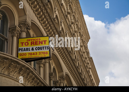 Offices to rent sign hanging off side of building in London Stock Photo