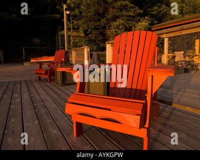 Adirondack chairs on a dock, Lake of the Woods, Ontario, Canada Stock Photo