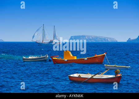 Colorful fishing boats in Ammoudi Bay near Oia Thira on the Greek Island of Santorini Greece Stock Photo