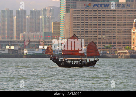 A junk sailing in Victoria Harbor Hong Kong China Stock Photo