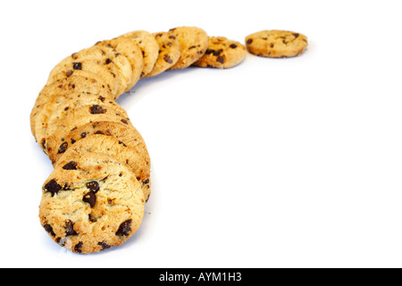 Chocolate chip cookies in a curved pattern on a white background with space for text Stock Photo