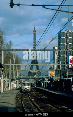 View of Eiffel Tower beyond railway lines Paris France Stock Photo