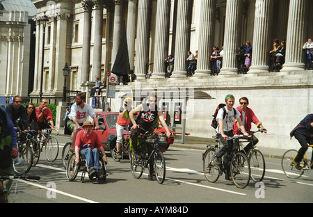 Anarchists on bicycles in front of the National Gallery at the Anti capitalist protest on May Day 2000 in London Stock Photo