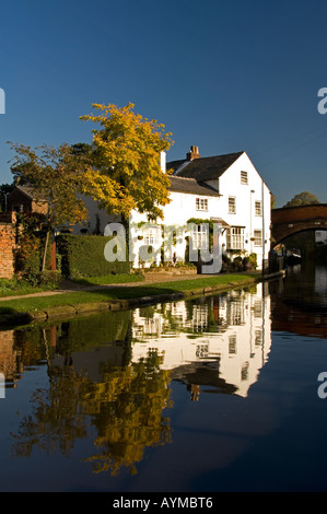 Bridgewater House Reflected in the Bridgewater Canal, Lymm, Cheshire, England, UK Stock Photo