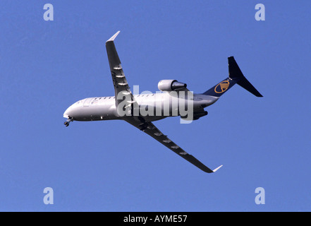 regional twin jet in flight operated by Lufthansa Stock Photo