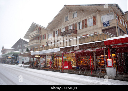 Ski shops in heavy snow fall - Grindelwald - Brenese Swiss Alps Stock Photo
