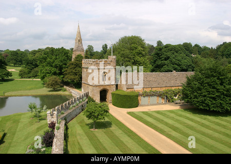 UK Oxfordshire Broughton Castle gatehouse and church Stock Photo