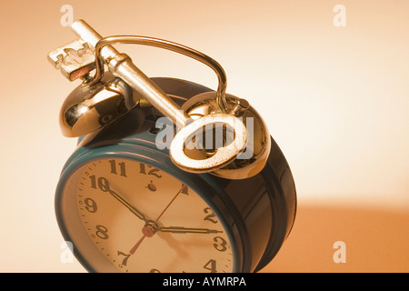 Skeleton Key on Alarm Clock Stock Photo