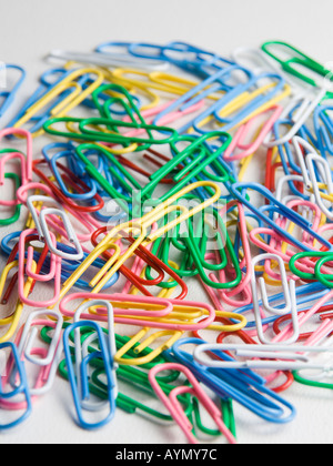 Colorful paper clips on a white background Stock Photo