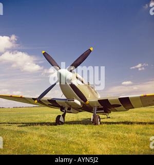 Supermarine Spitfire Mk IX MH434 on a grass airfield in UK Stock Photo