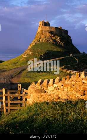 Lindisfarne castle on Holy Island bathed in summer evening light Stock Photo