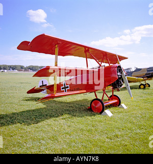 German Fokker Triplane replica Fok FI102 17 on a grass airfield at UK EU Stock Photo