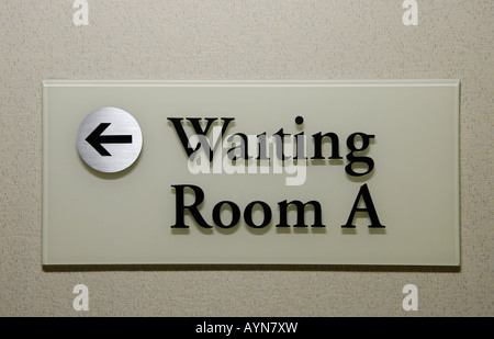 Sign for the waiting room at a suite of physician s offices Stock Photo