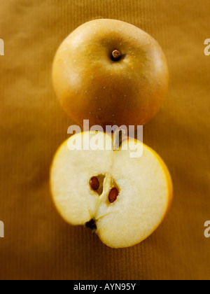 Organic Russet apple cut and whole Stock Photo