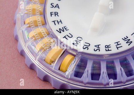 HRT Hormone replacement therapy tablets in a plastic daily dispenser for a month Stock Photo