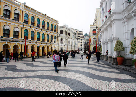 SENADO SQUARE WITH TRADITIONAL SWIRLING BLACK AND WHITE PAVING IS THE FOCAL POINT OF THE HISTORIC PORTUGUESE CENTRE OF MACAU Stock Photo