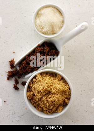 Raw sugar - from top - golden, Moscavado and demorera Stock Photo