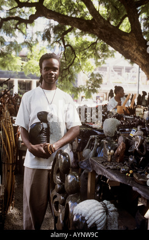 Man selling crafts on a market stall in Harare, Zimbabwe, East Africa Stock Photo