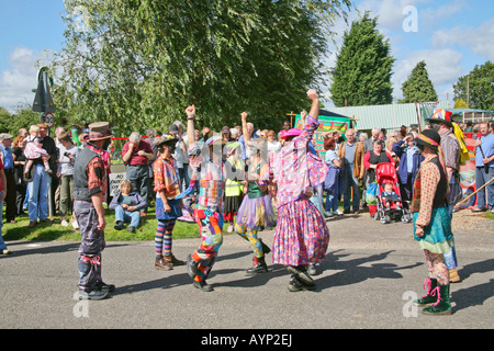 English traditional black face Molly Dancers performing at the Burston Rally in Norfolk England Stock Photo